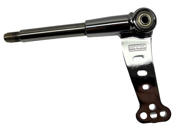 Metal mechanical component with 'DTK' branding on a gray background